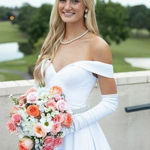 White bridal/debutante gown.